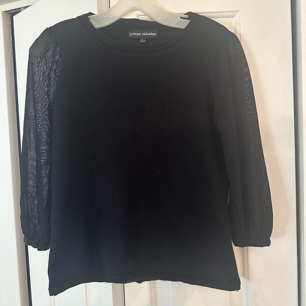 Black top with sheer sleeves